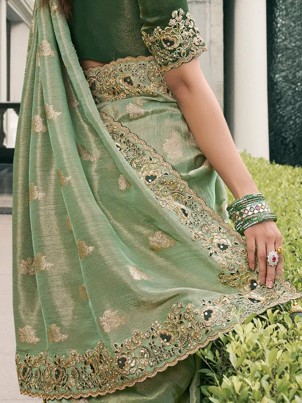 Pista green tissue silk saree for special gatherings