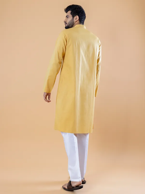 Plain cotton kurta suit in yellow