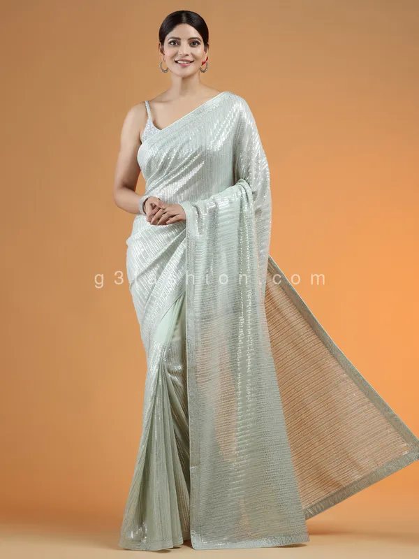 Powder green sequins fabric saree for party events