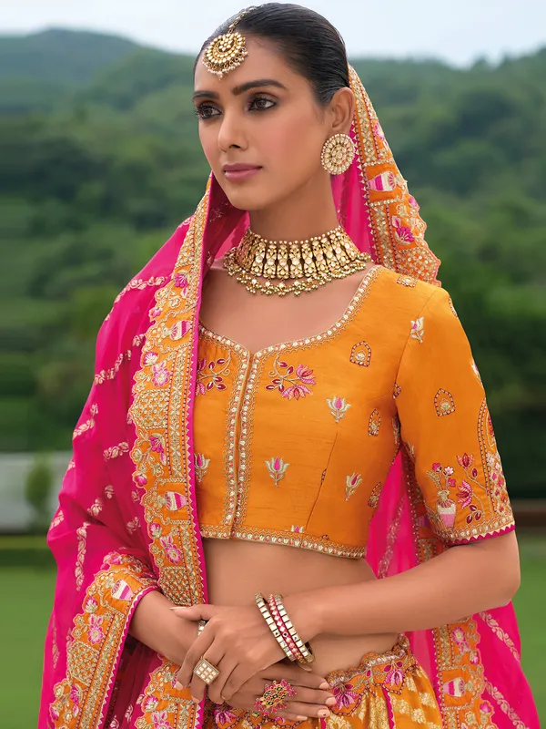 Pretty orange wedding style lehenga choli