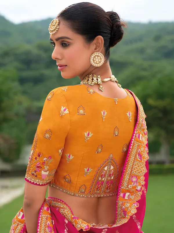 Pretty orange wedding style lehenga choli