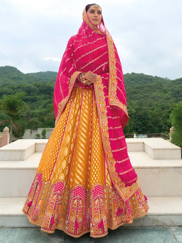 Pretty orange wedding style lehenga choli