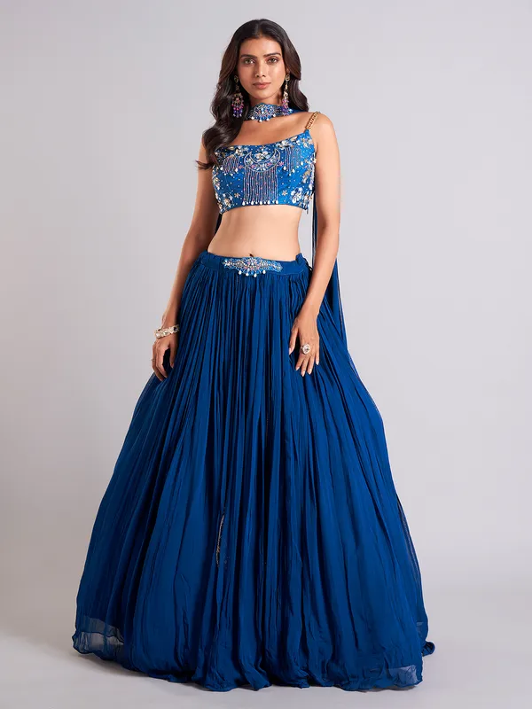 Pretty teal blue lahenga choli in georgette