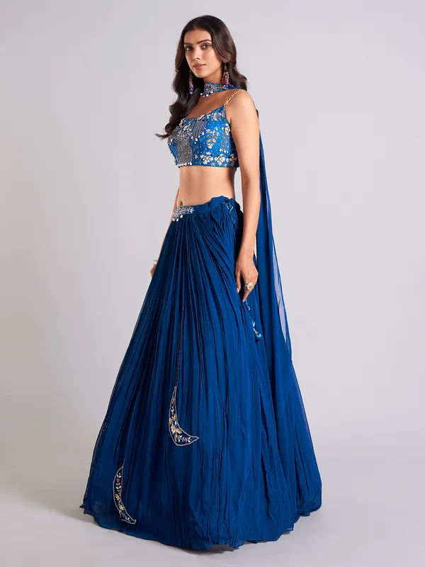 Pretty teal blue lahenga choli in georgette