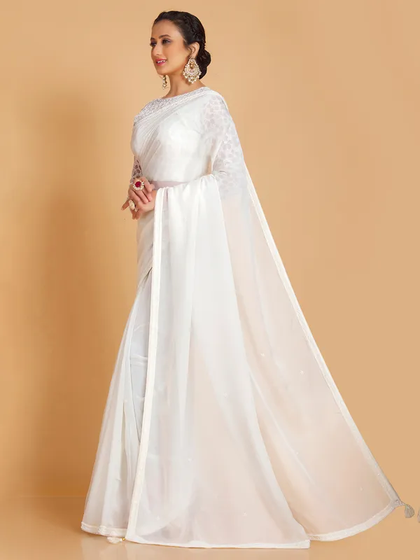 Pretty white soft organza saree