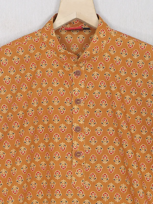 Printed bronze orange cotton kurta suit