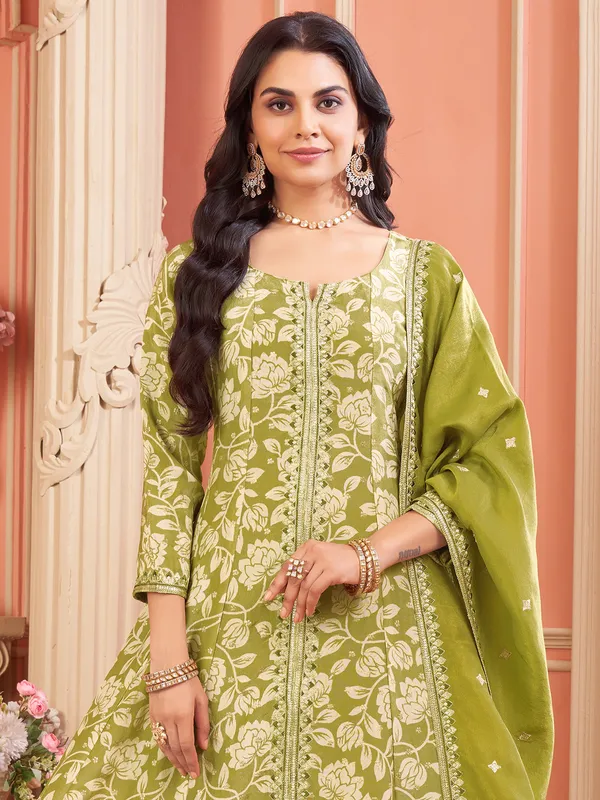 Printed green silk salwar suit for wedding wear