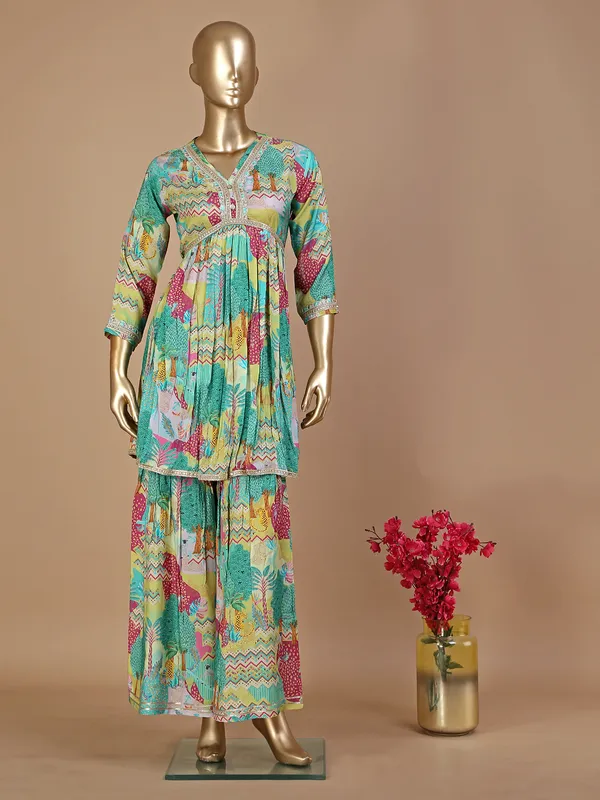 Printed green silk sharara suit
