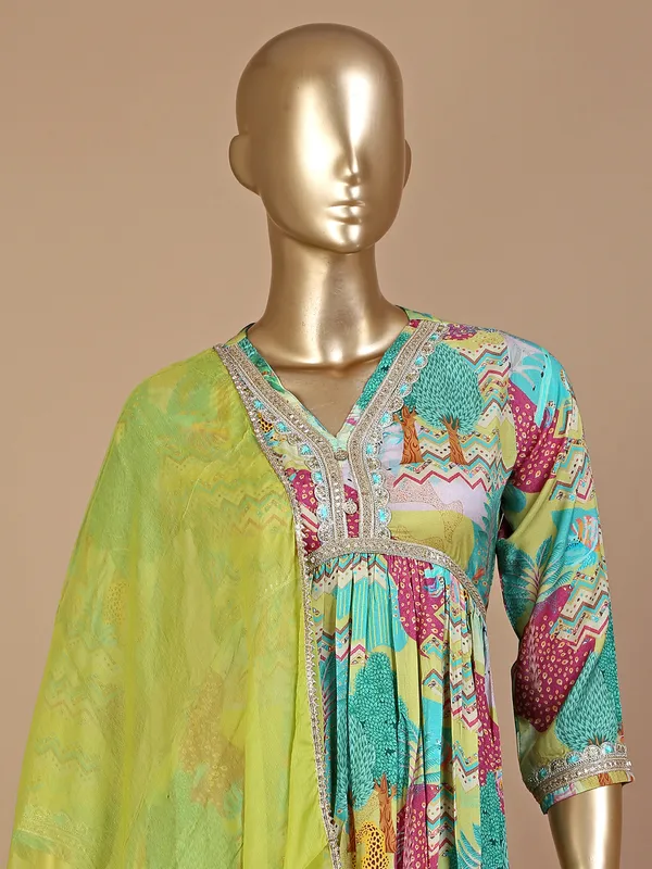 Printed green silk sharara suit