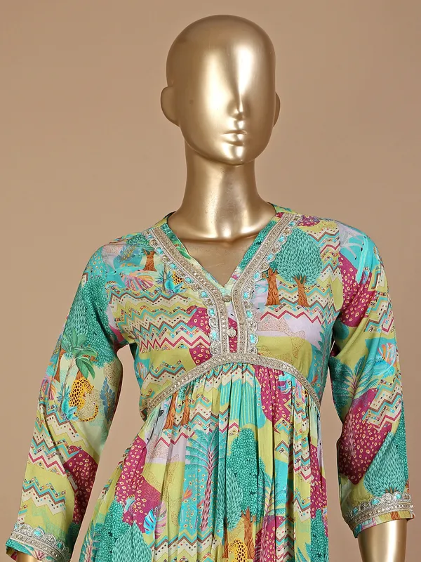 Printed green silk sharara suit