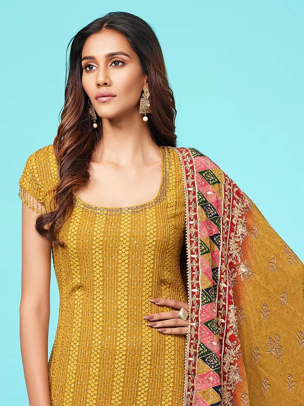 Printed mustard yellow georgette sharara suit