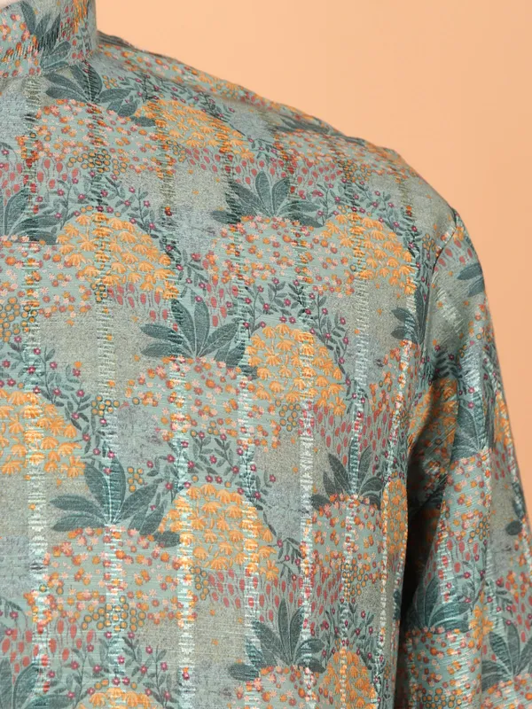 Printed silk kurta suit in green