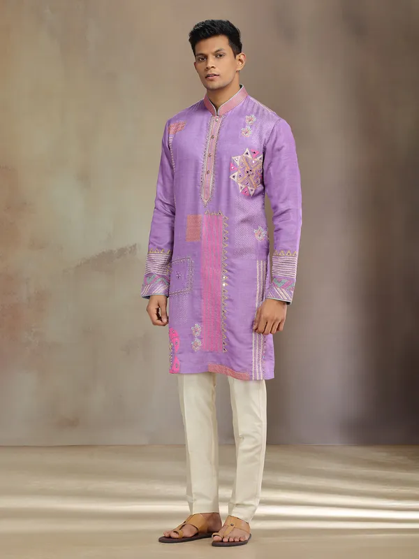 Purple silk kurta suit with aabla and resham work