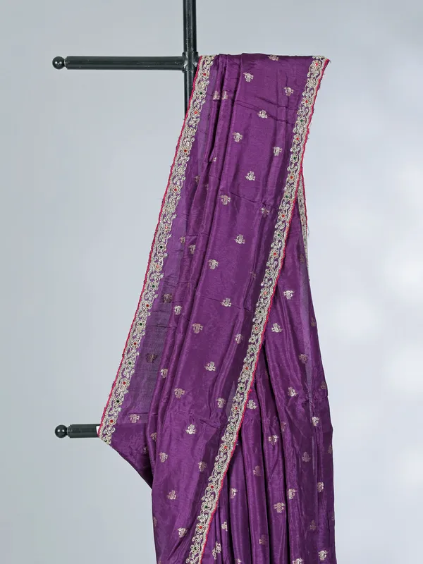 Purple dola silk saree with bold pink blouse