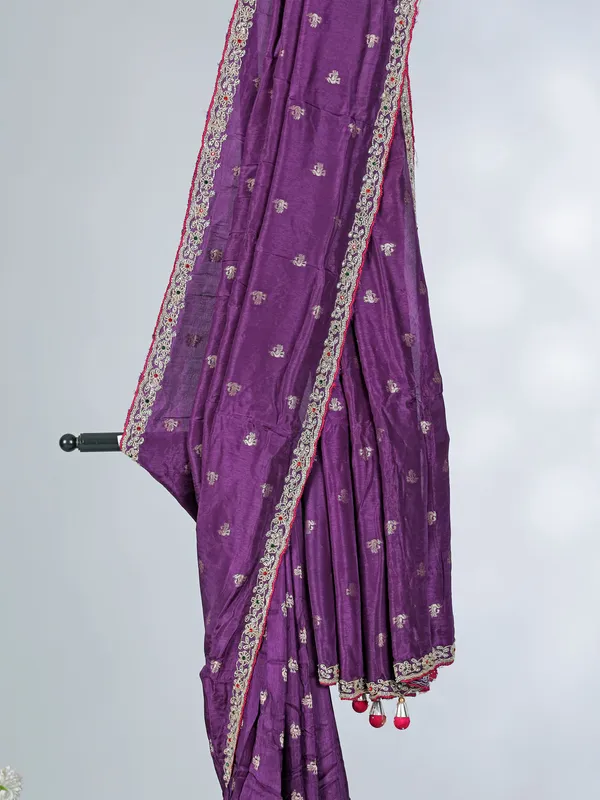 Purple dola silk saree with bold pink blouse