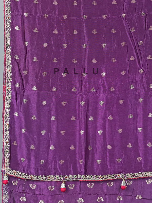Purple dola silk saree with bold pink blouse