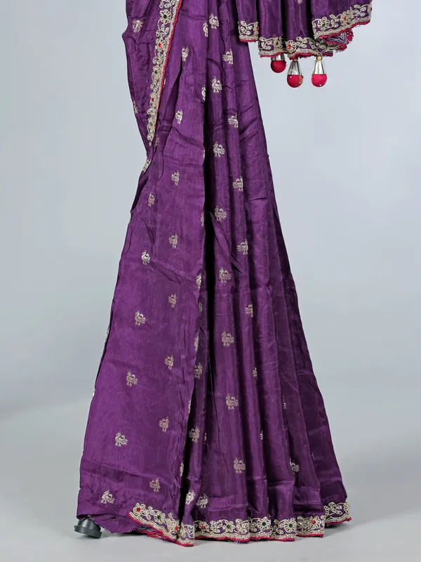 Purple dola silk saree with bold pink blouse
