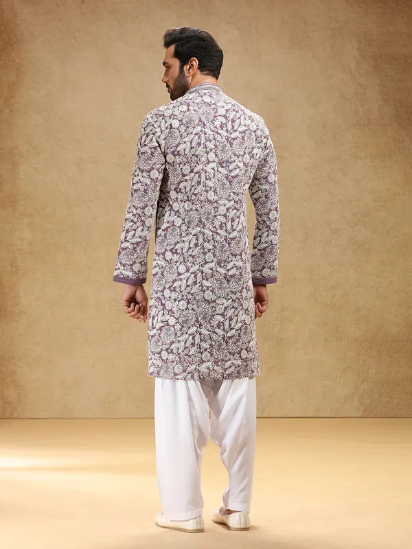 Purple georgette kurta suit with bold embroidery