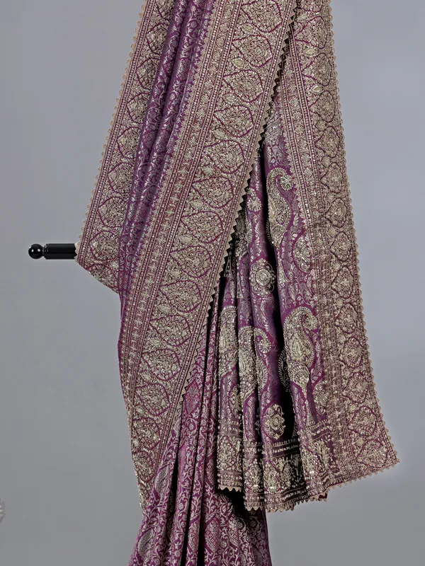 Purple kanjivaram silk saree with royal embellishments