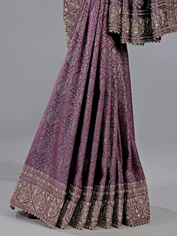 Purple kanjivaram silk saree with royal embellishments