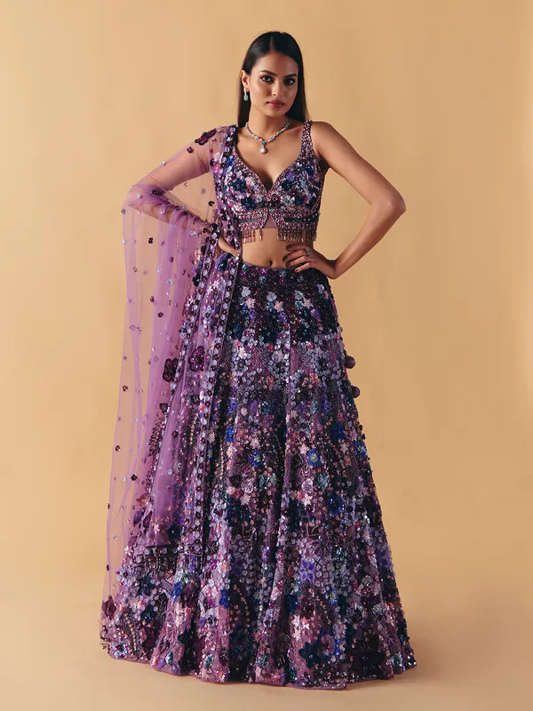 Purple net pearl and sequins lehenga choli