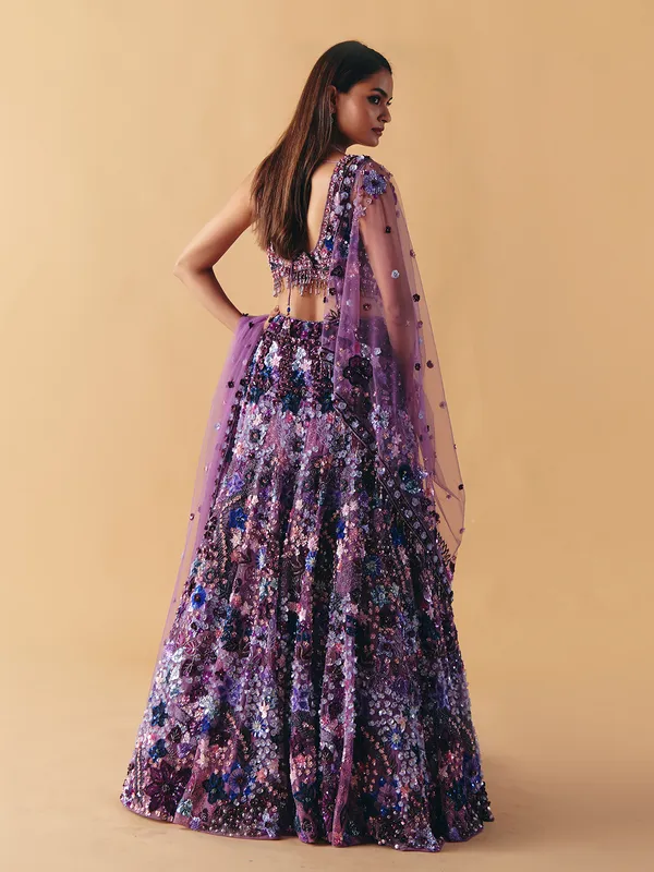 Purple net pearl and sequins lehenga choli