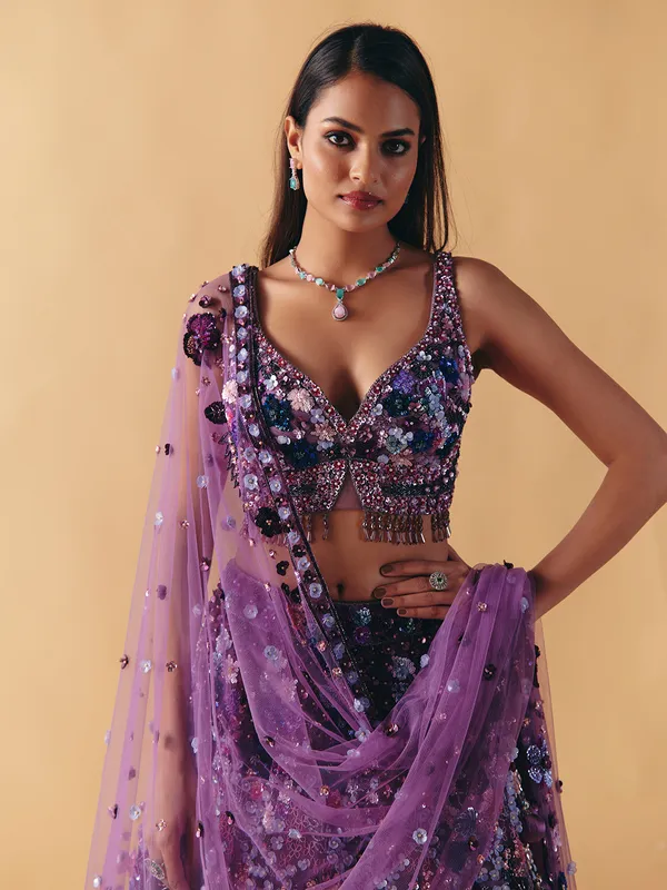 Purple net pearl and sequins lehenga choli