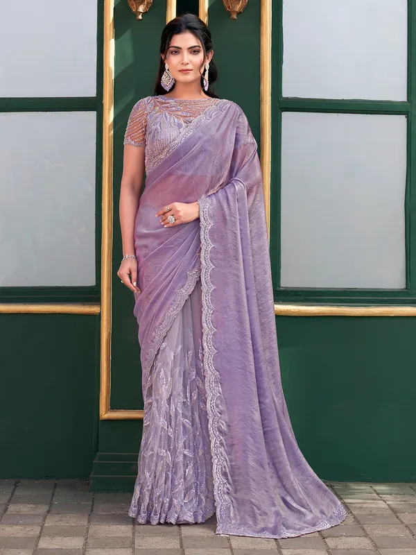 Purple net saree with gentle shine and beads
