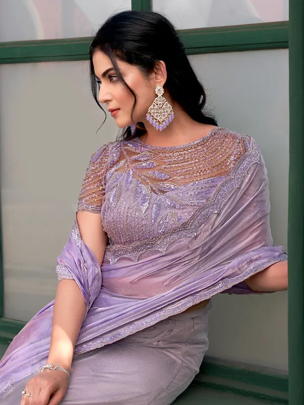 Purple net saree with gentle shine and beads