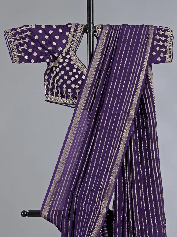 Purple organza saree with traditional sparkle