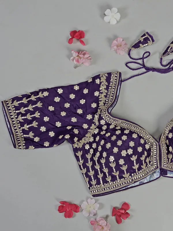 Purple organza saree with traditional sparkle