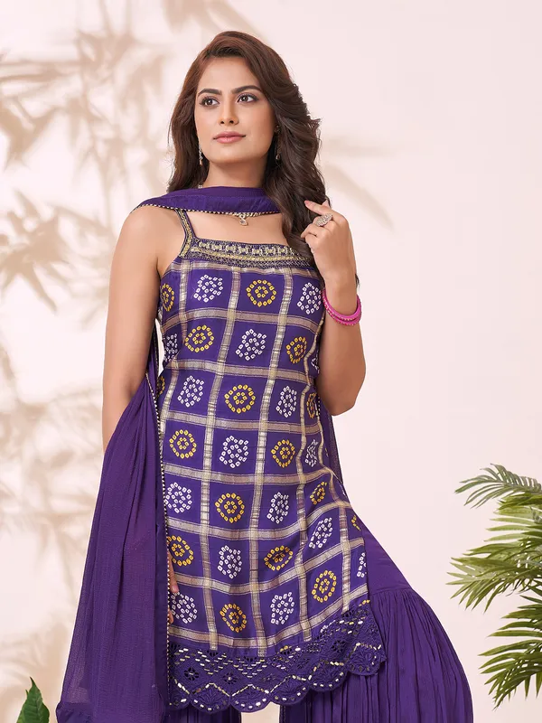 Purple printed sharara suit with heavy embellishments