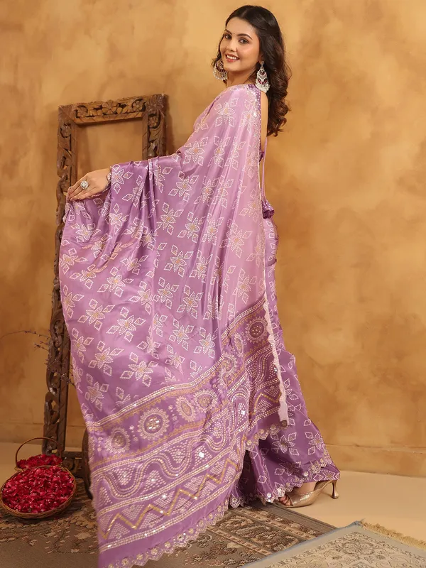 Purple printed silk saree for festive gatherings