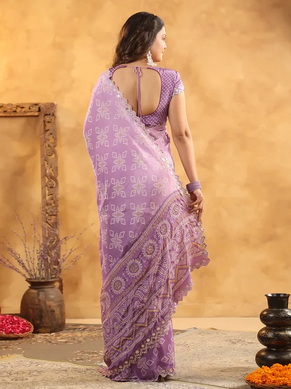 Purple printed silk saree for festive gatherings