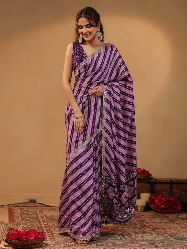 Purple printed silk saree with resham and gota detailing