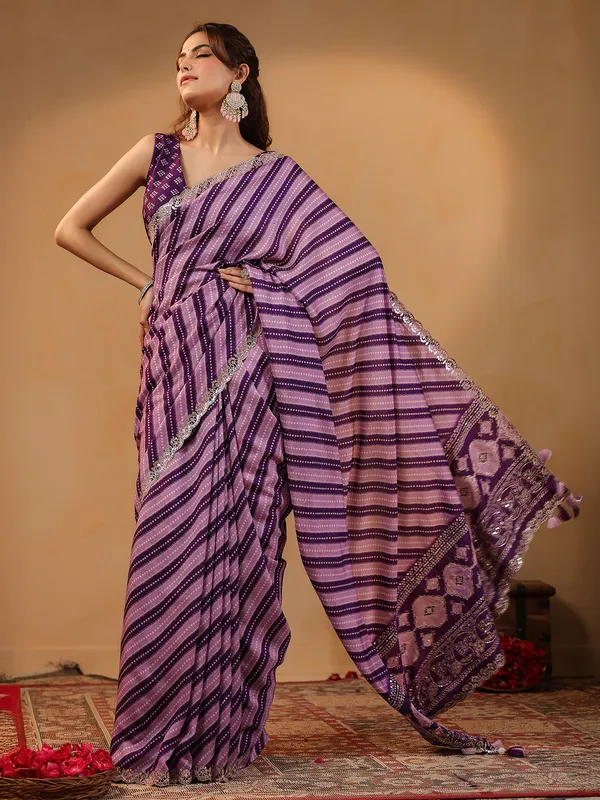 Purple printed silk saree with resham and gota detailing