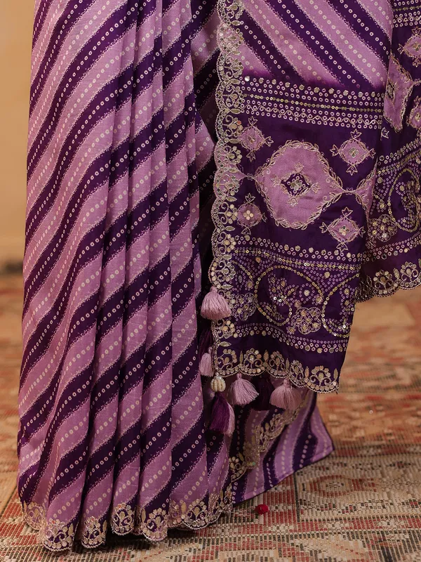 Purple printed silk saree with resham and gota detailing