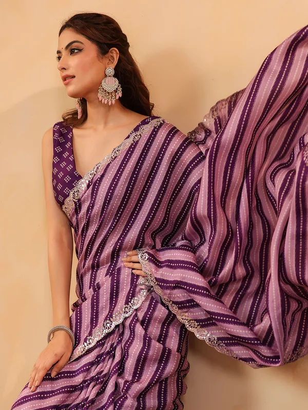 Purple printed silk saree with resham and gota detailing