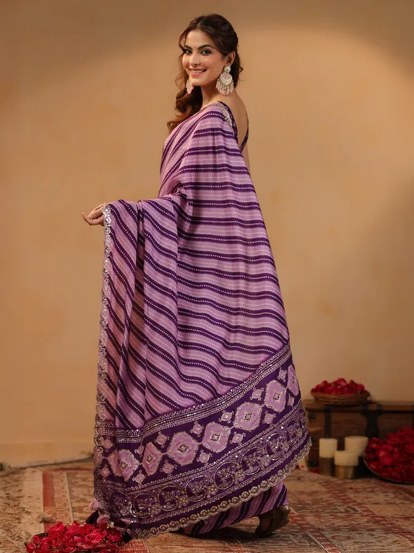 Purple printed silk saree with resham and gota detailing