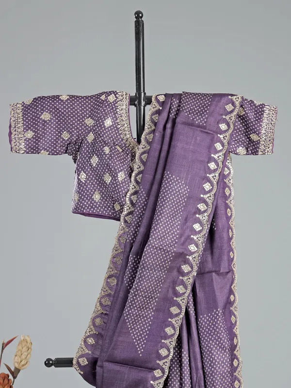 Purple printed silk saree with V neck blouse