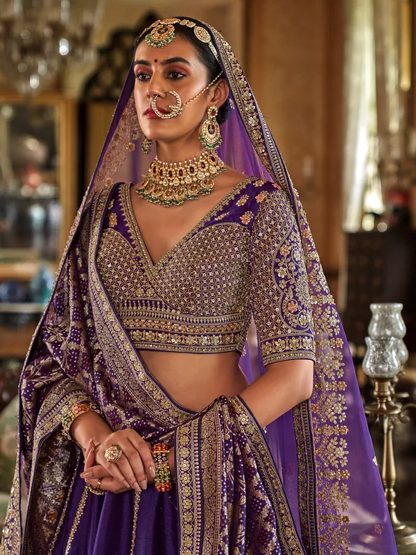 Purple silk bridal lehenga choli with rich sequins detailing