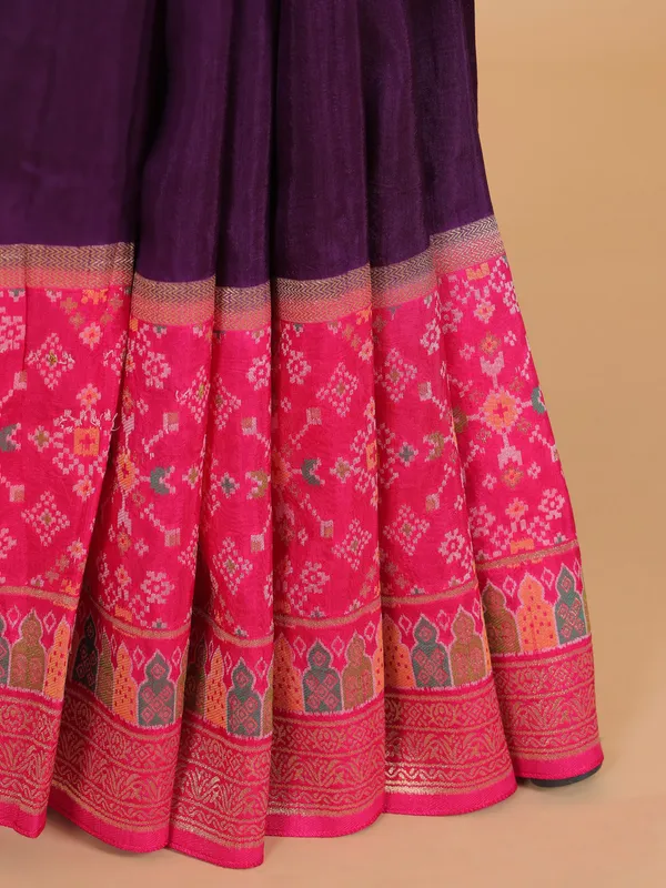 Purple silk saree with bold pink border