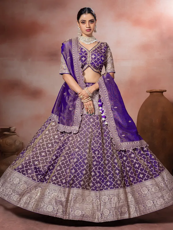 Purple tissue silk zardosi lehenga choli