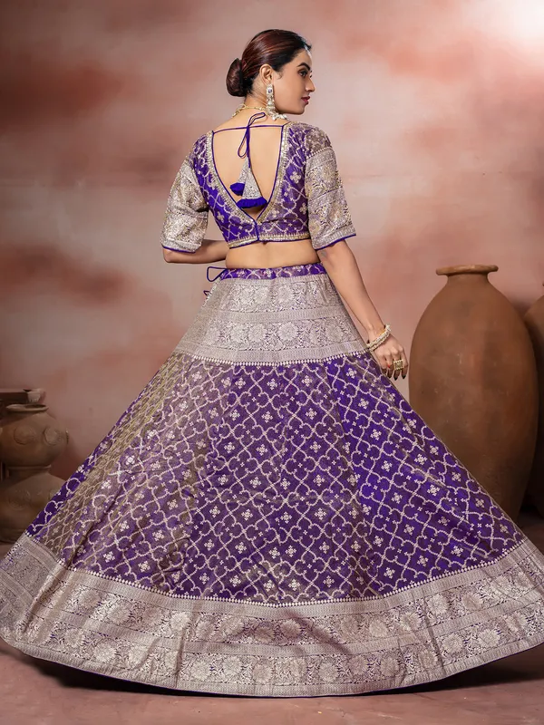 Purple tissue silk zardosi lehenga choli