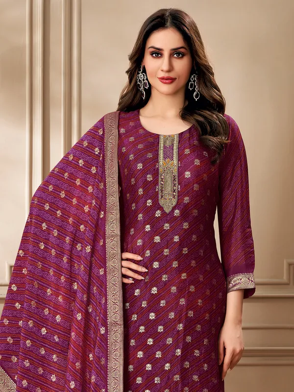 Purple zari worked organza salwar suit