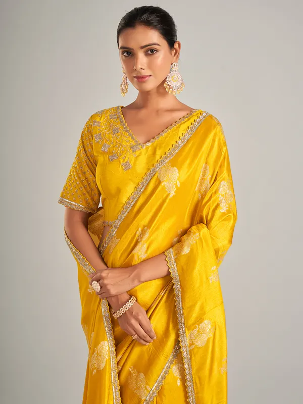 Radiant mustard yellow silk saree with zari work
