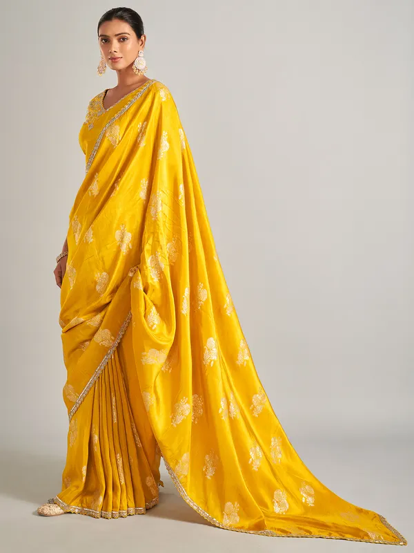 Radiant mustard yellow silk saree with zari work