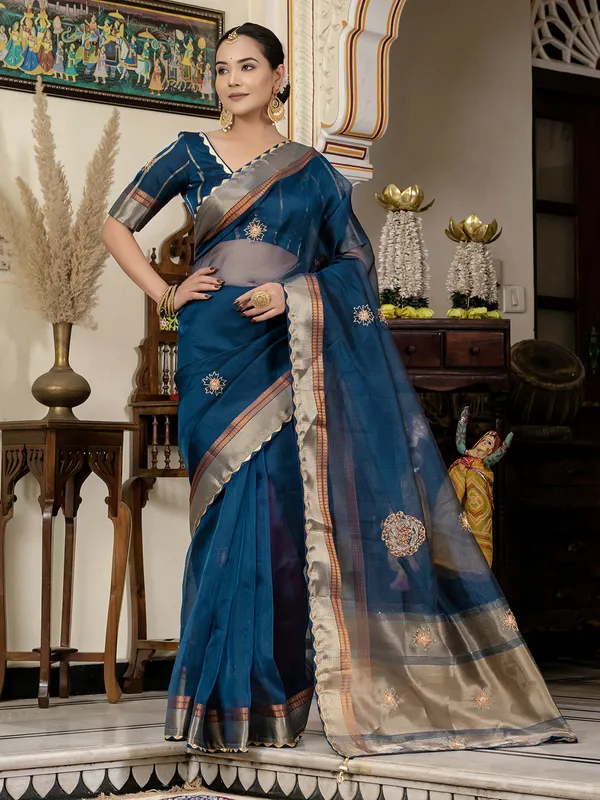 Rama blue linen saree with elegant zari weaving