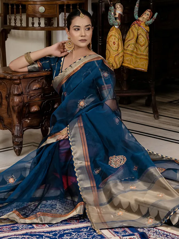 Rama blue linen saree with elegant zari weaving