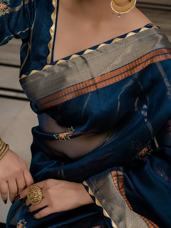Rama blue linen saree with elegant zari weaving